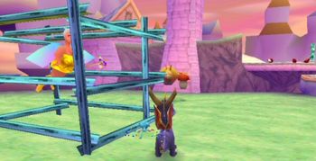 Spryo next to a trapped fairy in a cage.