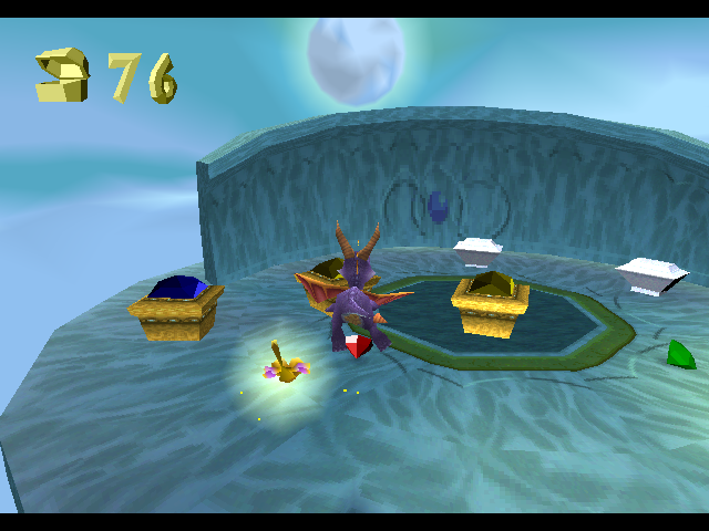 Spyro gliding to an area with a few treasure chests