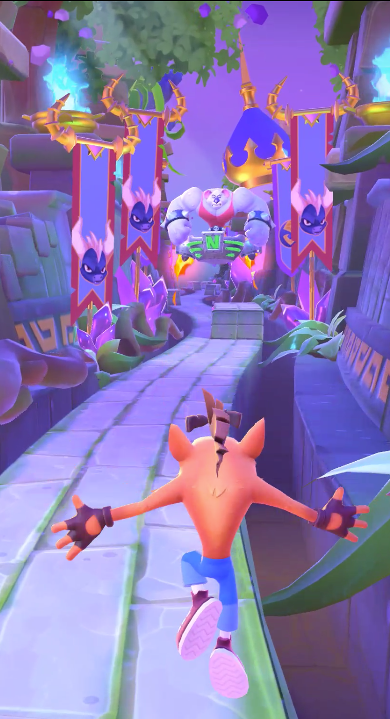 Crash battling Koala Kong with Dark Spyro banners around them.