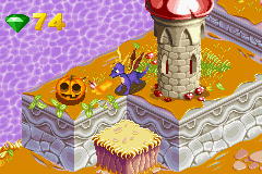 Spyro stands next to a pumpkin