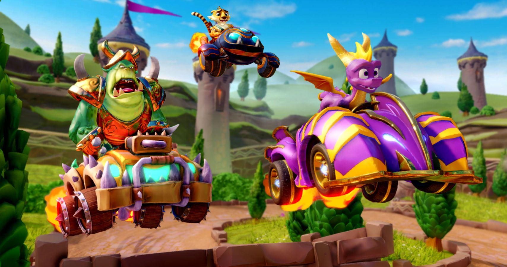Spyro, Gnasty Gnorc and Hunter race each other on the track.