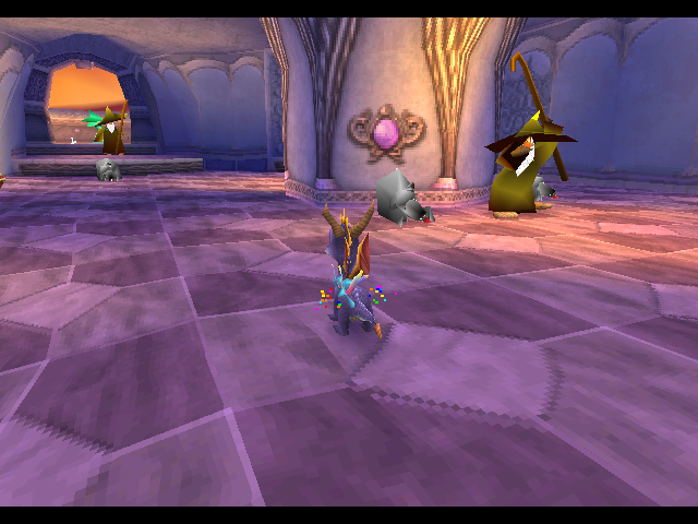 Spyro in a castle-like structure with a few Shepherds and Sleeping Dogs
